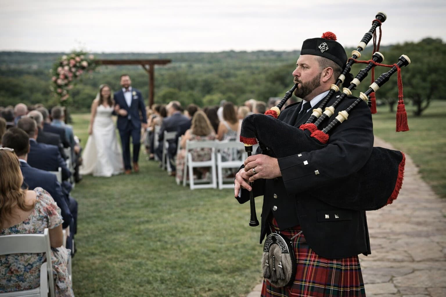 Bagpiper leading a wedding processional